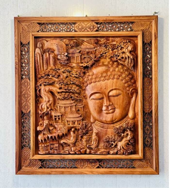 Tranh gỗ điêu khắc tượng Phật Tổ Như Lai thế hiện đức tin vào Phật Pháp của gia chủ(Nguồn: Internet)